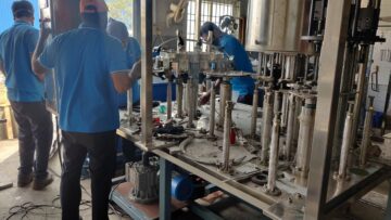 Fully Automatic Rinsing Filling Capping  Blow molding Machine at Peenya Bangalore in India